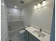 Bathroom with white subway tile and gray vanity provide a modern and stylish space at 180 Sandy Bend Ln, Summerville, SC 29486