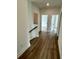 Upstairs hallway featuring wood floors and multiple rooms, perfect for a growing Gathering at 180 Sandy Bend Ln, Summerville, SC 29486