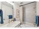 Clean bathroom with a tub shower combination, updated fixtures and a modern design at 715 Maynard Ln, Summerville, SC 29486