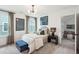 Stylish bedroom with a comfortable bed and a sitting area at 715 Maynard Ln, Summerville, SC 29486