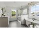 Modern bathroom with marble shower, soaking tub, and hexagon tile floor at 505 Fiskdale Cir, Summerville, SC 29486