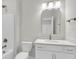 Modern bathroom with white cabinetry, single sink, chrome fixtures, and a shower/tub combo at 704 Maynard Ln, Summerville, SC 29486