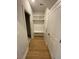 Bright mud room with white built-in storage and wood-look flooring at 704 Maynard Ln, Summerville, SC 29486