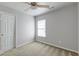 Neutral bedroom with carpet, a ceiling fan, and a closet at 7034 Lanier St, Hanahan, SC 29410