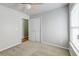 Comfortable bedroom featuring soft carpet, neutral wall paint, a ceiling fan, and closet at 7034 Lanier St, Hanahan, SC 29410