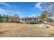 Ranch-style home with front porch and steps, situated on a lot with mature trees at 964 Short Cut Rd, Dorchester, SC 29437