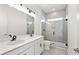 Modern bathroom featuring a double sink vanity, sleek black fixtures, and a tiled glass enclosed shower at 143 Summerwind Dr, Summerville, SC 29486