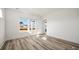 Sunny bedroom with natural light, wood flooring, and white trim at 143 Summerwind Dr, Summerville, SC 29486