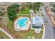Aerial view of community pool, clubhouse, and surrounding landscape at 1639 Cultivation Ln # 449, Mount Pleasant, SC 29466