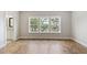 Spacious bedroom with hardwood floors and large windows at 1639 Cultivation Ln # 449, Mount Pleasant, SC 29466