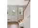 Front entry with hardwood floors and staircase at 1639 Cultivation Ln # 449, Mount Pleasant, SC 29466
