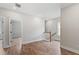 Bright hallway with hardwood floors and access to bedrooms at 1639 Cultivation Ln # 449, Mount Pleasant, SC 29466
