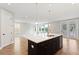 Open concept kitchen with island and access to deck at 1639 Cultivation Ln # 449, Mount Pleasant, SC 29466