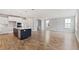 Open kitchen with large island and hardwood floors at 1639 Cultivation Ln # 449, Mount Pleasant, SC 29466