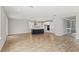 Open kitchen with island, white cabinets, and stainless steel appliances at 1639 Cultivation Ln # 449, Mount Pleasant, SC 29466