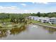 Aerial view of community with pond, fountain, and lush landscaping at 1686 Cultivation Ln # 544, Mount Pleasant, SC 29466