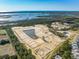 Aerial view of new home community under construction near waterfront at 1686 Cultivation Ln # 544, Mount Pleasant, SC 29466