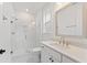 Clean bathroom with white tile shower and quartz countertop at 1686 Cultivation Ln # 544, Mount Pleasant, SC 29466