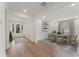 Dining room with hardwood floors, a table, and chairs at 1686 Cultivation Ln # 544, Mount Pleasant, SC 29466