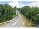 Aerial view of Liberty Hill Farm road with lush trees and landscaping at 1686 Cultivation Ln # 544, Mount Pleasant, SC 29466