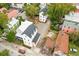 This aerial view showcases this home's roof, rear yard, and surrounding neighborhood at 72 Drake St # A, Charleston, SC 29403