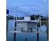 View of a sturdy boat lift showcasing a clean and ready-to-use boat at 8272 Palmetto Rd, Edisto Island, SC 29438