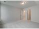 Bright bedroom with neutral carpeting and ample closet space at 1892 Nola Run Run, Summerville, SC 29485