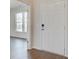 Bright entryway with hardwood floors and modern door at 1892 Nola Run Run, Summerville, SC 29485