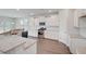 Open kitchen with large island and ample cabinet space at 1892 Nola Run Run, Summerville, SC 29485