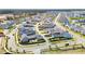 Planned community with colorful single-Gathering homes, landscaped yards, and sidewalks in a residential area at 450 Ripple Park Dr, Summerville, SC 29486