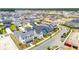 New suburban homes with varied exterior colors, garages, and well-maintained front yards at 450 Ripple Park Dr, Summerville, SC 29486