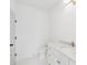 Elegant bathroom with a white marble countertop, a white vanity, and gold hardware at 450 Ripple Park Dr, Summerville, SC 29486