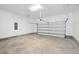 Spacious garage with concrete floor and garage door opener at 450 Ripple Park Dr, Summerville, SC 29486