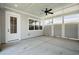 A covered patio with recessed lighting, ceiling fan, concrete floor, and gray wood-look siding at 450 Ripple Park Dr, Summerville, SC 29486