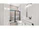 Modern bathroom with a tiled glass shower, sleek vanity, and contemporary black hardware at 133 Summerwind Dr, Summerville, SC 29486