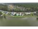 Houses along lakefront with lush green trees at 1713 Pimlico Blvd, Moncks Corner, SC 29461