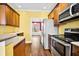 Kitchen features stainless steel appliances and wood cabinets at 1713 Pimlico Blvd, Moncks Corner, SC 29461