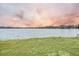 Scenic lake view from the property during sunset at 1713 Pimlico Blvd, Moncks Corner, SC 29461