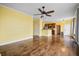 Open concept living space with hardwood floors and kitchen access at 1713 Pimlico Blvd, Moncks Corner, SC 29461