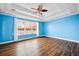 Main bedroom with hardwood floors and water view at 1713 Pimlico Blvd, Moncks Corner, SC 29461