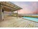 Spacious pool deck overlooking the lake at sunset at 1713 Pimlico Blvd, Moncks Corner, SC 29461