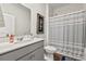 Bright bathroom features a single vanity, framed mirror, and a shower-tub combo at 360 Bering Ln, Summerville, SC 29486