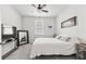 Minimalist bedroom with a white bed, a large mirror, and ample natural light at 360 Bering Ln, Summerville, SC 29486