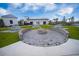Outdoor community firepit with seating and picnic tables, ideal for gatherings and enjoying the outdoors at 360 Bering Ln, Summerville, SC 29486