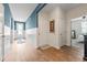 Open foyer with beadboard accent wall, and wood-look floors at 360 Bering Ln, Summerville, SC 29486