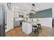 Modern kitchen with gray cabinets, granite countertops, and stainless steel appliances at 360 Bering Ln, Summerville, SC 29486