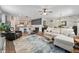 Spacious living room with open floor plan, stylish furnishings, and a shiplap accent wall at 360 Bering Ln, Summerville, SC 29486