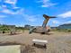 A unique airplane-themed playground with slides, swings, and wooden features, set against a blue sky at 120 Haverhill St, Summerville, SC 29486