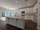 Spacious kitchen featuring a large island with granite countertops and stainless steel appliances at 120 Palfrey Dr, Ridgeville, SC 29472