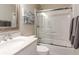 Bathroom with white vanity, quartz countertop, and a shower/tub combo at 2 Pelican Reach # Share 10, Isle of Palms, SC 29451